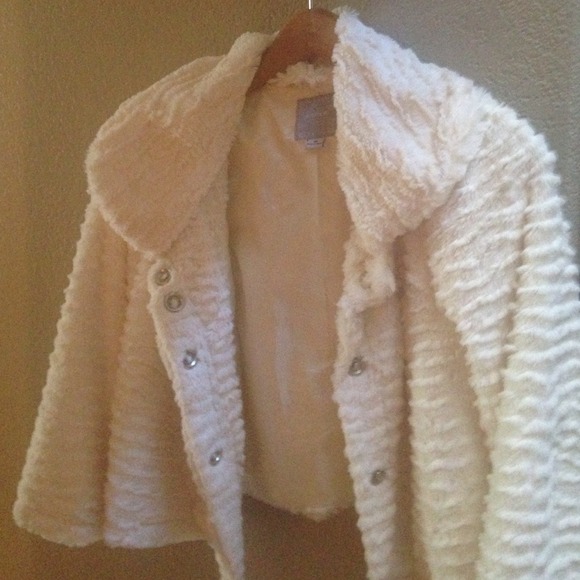 Cream colored faux fur cropped jacket