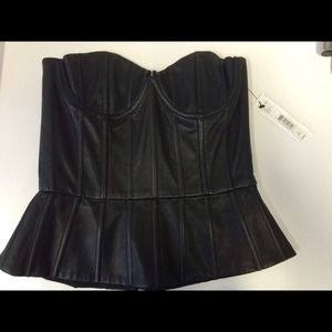 Leather and lace peplum bodice