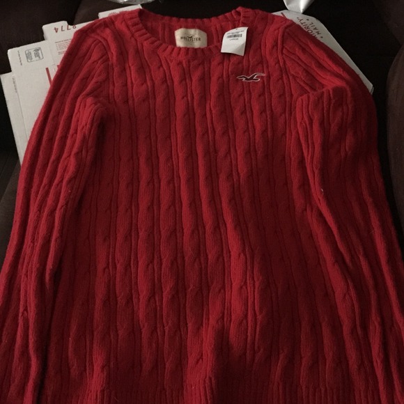 Red hollister sweater. Never worn.