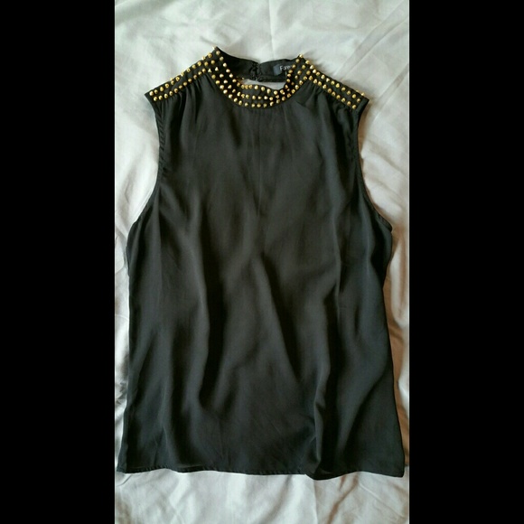Black sleeveless top with gold studs