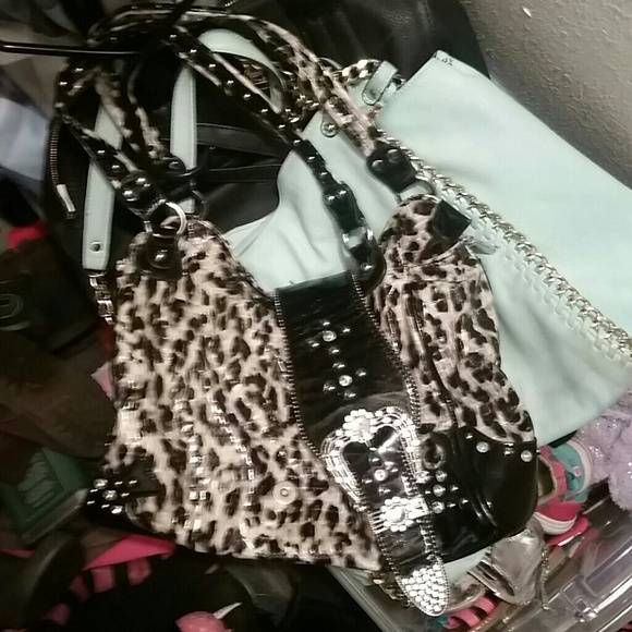 Leather cheetah purse woth buckle