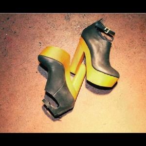 Black Messeca Gavin ankle strap platforms.