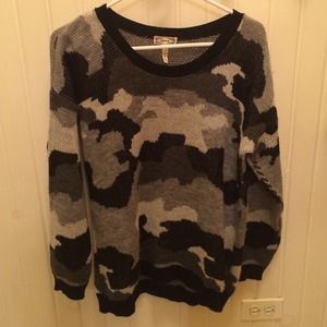 Black, gray, and white camo sweater.