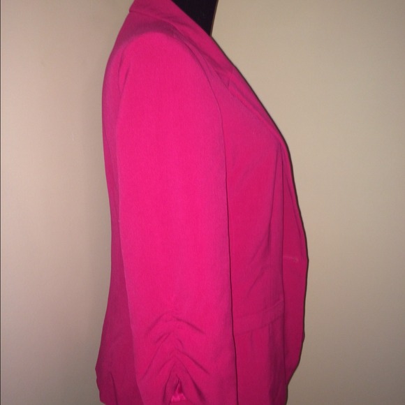 Fushia colored blazer. 3/4 sleeves