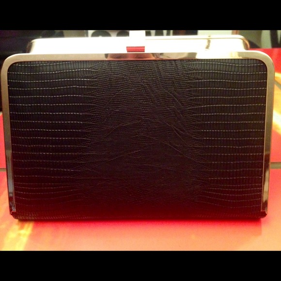 Faux snake skin leather clutch...