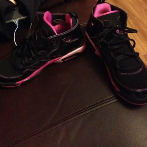 Hot pink and black Jordan's
