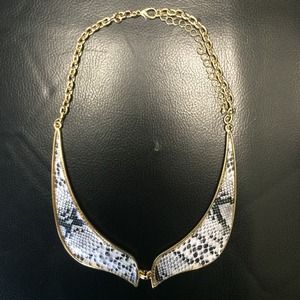 Snakeskin print necklace.