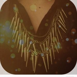 One gold and one silver spikes necklace
