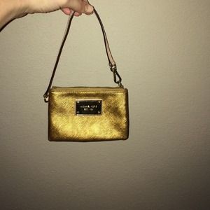 gold Michael kors wristlet