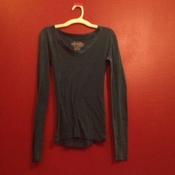 Turquoise long sleeve, with a slight v neck