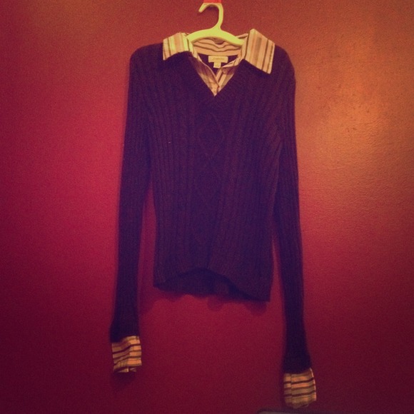 Classic navy sweater with cuff and collar details