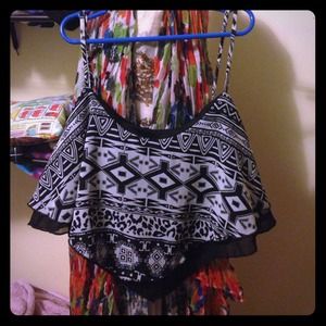 Crop top, black and white pattern, comes to a "V"