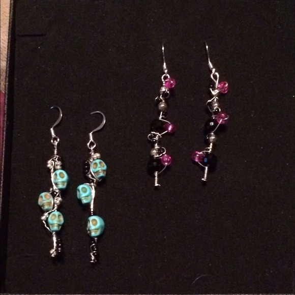 Turquoise skull earrings wrapped in silver wire