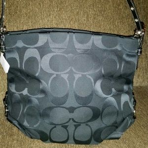 Black Coach 24 cm signature duffle.  New with tags