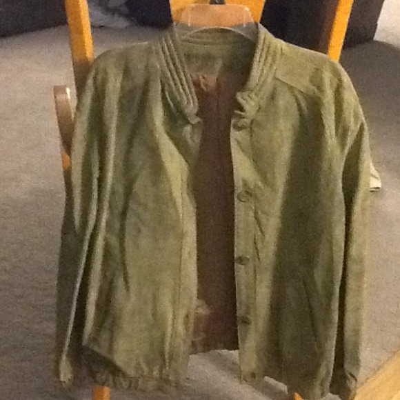 Woman's vintage olive green suede jacket.