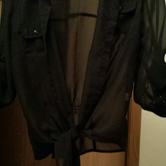 Black see through shirt fits like a medium