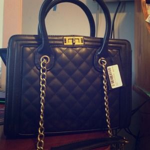 Black purse (never used, still packed with paper)