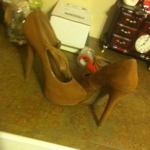 Strap across high heels