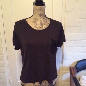 Black top with lace pocket.