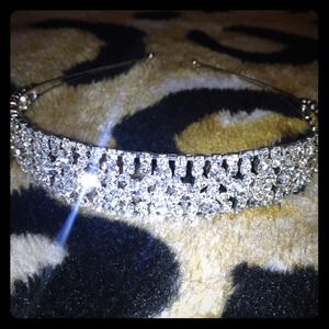 Silver diamond head crown.