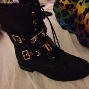 Black Combat boots with gold metal buckle