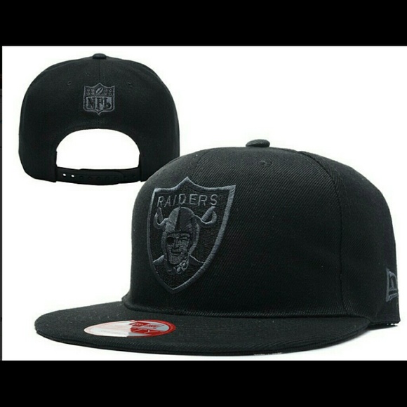 Oakland Raiders snapback hat.