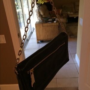 Cole haan purce/clutch black leather witness gold