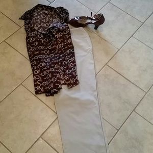 Straight leg slenderizing side zip khakis. NWOT