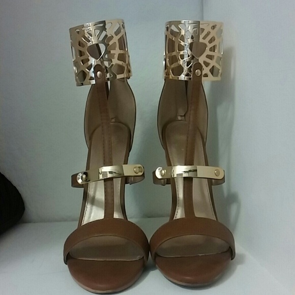 Brown and gold heels