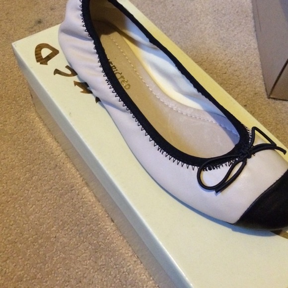 Restricted beige leather flats with cap toe sz 8