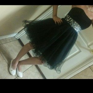 Im selling a black dress with silver