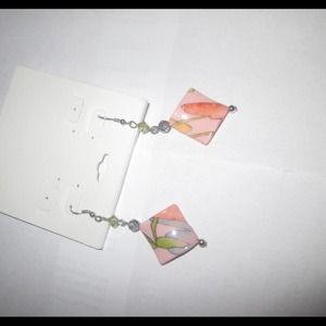 Vintage earring. Very light pink.