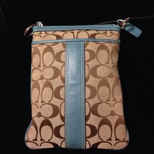 Coach with teal sling bag