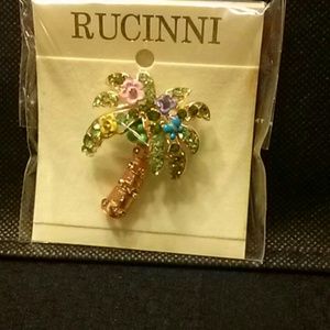 Rucinni brooch.