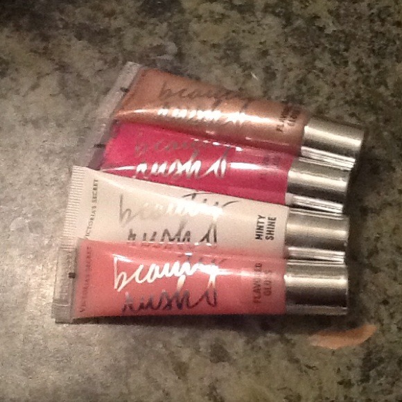 4 brand new victoria secret lip glosses