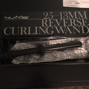 Reverse curling wand