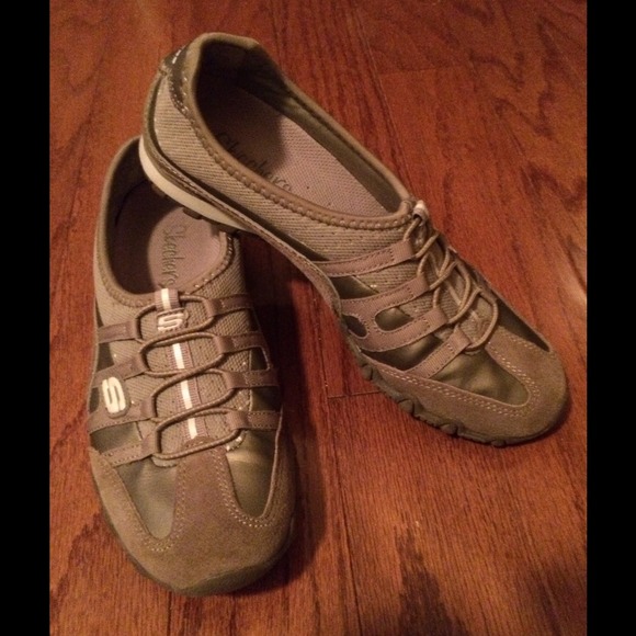 Skechers suede/fabric slip on tennis shoe.