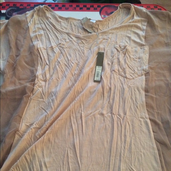 Beautiful top with see through sheer panels