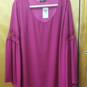 Fuchsia plus size dress with embroidered detail