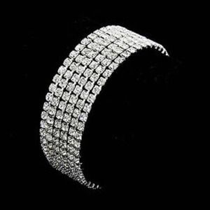 8 Rhinestone Bracelets & 9 Pair Of Spike Earrings