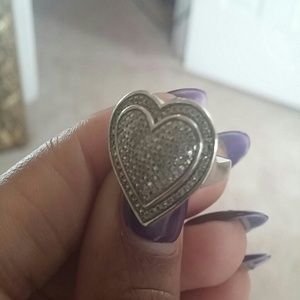 Diamond heart ring.