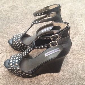Sketchers wedges with studded accents.