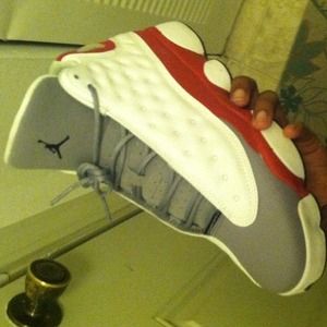 Red cement grey Jordan's size 7