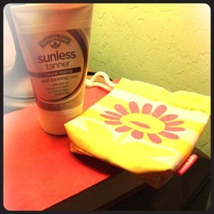 Clinique bag and Nature's Gate sunless tanner