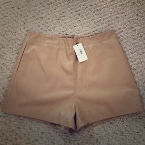 High-waisted Beige pleather shorts. Brand new.