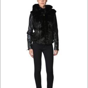 Black faux leather and faux fur jacket.