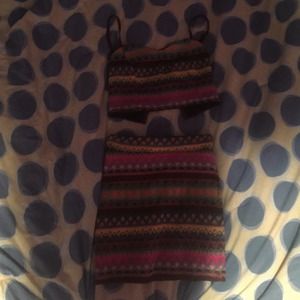 Two piece compliment getter