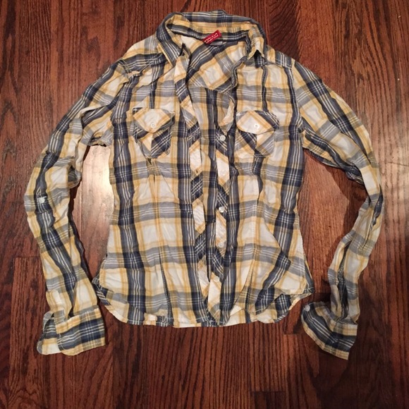 Blue and yellow plaid button up shirt.