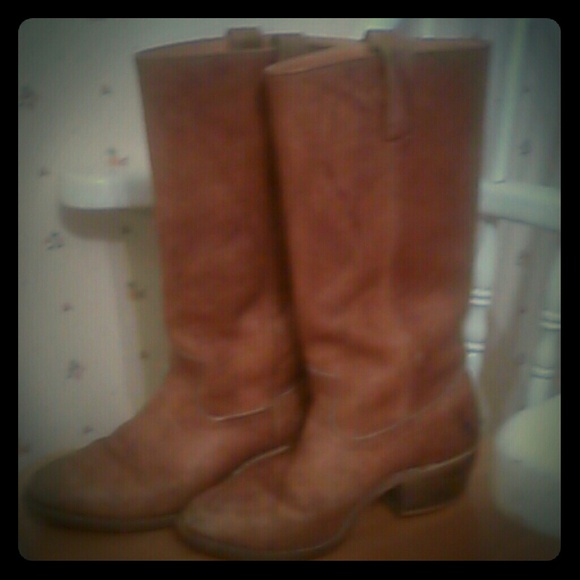 Leather boots, cowboy essence.