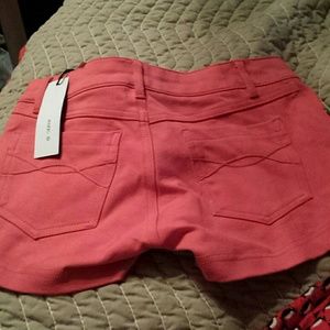Small coral shorts from body central